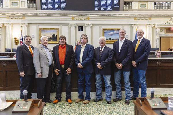 (L-R) Rep. Dick Lowe, Dr. Bob Kropp, Terry Richardson, Bill Wilkins, Stan Comer, Bill Robertson, and Tom Kissee on the floor of the Oklahoma House of Representatives.